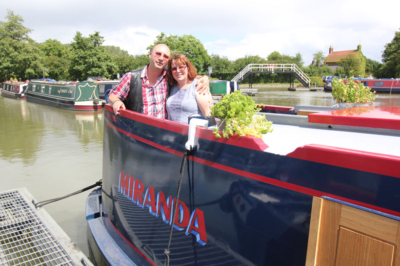 Sue-and-Nigel-Gray-aboard-their-newly-purchased-canal-boat-Miranda
