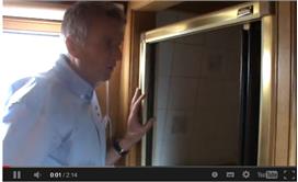 Water being emptied out of a shower on a narrowboat